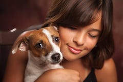 Pretty Hispanic Girl And Her Puppy Studio Portrait Pretty Hispanic Girl And Her Puppy Studio Portrait