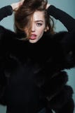 Pretty woman or girl with long hair in fur stock photo Pretty woman or girl with long hair in fur stock photo