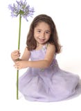 Pretty Smiling Girl Holding Flower Stock Photography