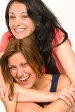 Pretty teens laughing and smiling at camera stock photo Pretty teens laughing and smiling at camera stock photo