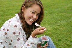 Pretty Woman Eating Yogurt