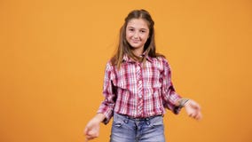 Pretty young girl making silly happy faces stock footage Pretty young girl making silly happy faces stock footage