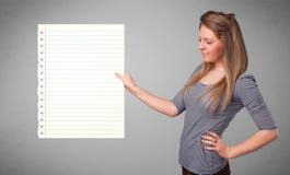 Young woman holding white paper copy space with diagonal lines royalty free stock photos Young woman holding white paper copy space with diagonal lines royalty free stock photos