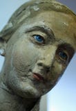 Primer de una estatua de piedra de la cara de una mujer Imagen de archivo libre de regalías Primer de una estatua de piedra de la cara de una mujer Imagen de archivo libre de regalías