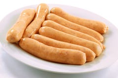 Primo piano delle salsiccie crude di chipolata Immagini Stock Primo piano delle salsiccie crude di chipolata Immagini Stock