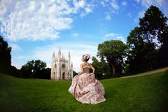 Princess In An Vintage Dress Before Castle Stock Photo