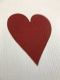 Macro View of a Heart on a Textured Playing Card Royalty Free Stock Photos Macro View of a Heart on a Textured Playing Card Royalty Free Stock Photos