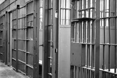 Prison jail cell locked bars