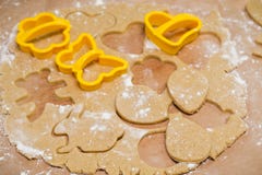 Process of cutting gingerbread in the shape of hearts, butterflies and flowers stock photography Process of cutting gingerbread in the shape of hearts, butterflies and flowers stock photography