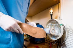 The process of manufacturing orthopedic individual insoles for people with leg diseases, flat feet. Close-up of a man`s hand of a stock images The process of manufacturing orthopedic individual insoles for people with leg diseases, flat feet. Close-up of a man`s hand of a stock images