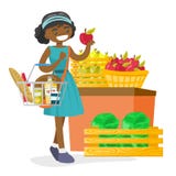 Produits de achat de jeune femme d'afro-américain illustration stock Produits de achat de jeune femme d'afro-américain illustration stock