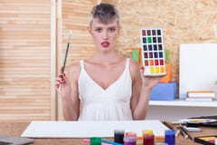 Professeur d'art avec la peinture photo stock Professeur d'art avec la peinture photo stock