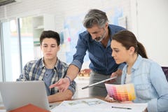 Professor with students in architecture school stock image Professor with students in architecture school stock image