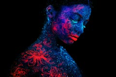 Profile Portrait Of A Beautiful Girl Alien. Ultraviolet Body Art Blue Night Sky With Stars And Pink Jellyfish Royalty Free Stock Photos