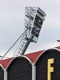 Projetores acima do estádio da estrada do vicariato, Watford imagens de stock Projetores acima do estádio da estrada do vicariato, Watford imagens de stock
