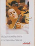 A propaganda de cartaz Austrian Airlines no compartimento desde 1992, lá é música no slogan do ar foto de stock A propaganda de cartaz Austrian Airlines no compartimento desde 1992, lá é música no slogan do ar foto de stock