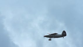 Propeller aircraft flying in the sky