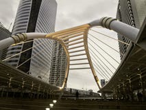 Pubic skywalk with modern buildings. Of Bangkok downtown square in business zone, sepia color stock photos Pubic skywalk with modern buildings. Of Bangkok downtown square in business zone, sepia color stock photos