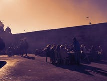 Puesta del sol colorida del mercado de pesca en África fotografía de archivo libre de regalías Puesta del sol colorida del mercado de pesca en África fotografía de archivo libre de regalías