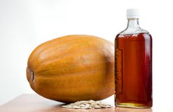 Pumpkin Oil In A Bottle, Pumpkin, Pumpkin Seeds Royalty Free Stock Photos