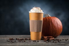 Pumpkin spice latte in a paper cup royalty free stock photography Pumpkin spice latte in a paper cup royalty free stock photography