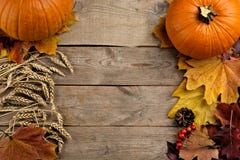 Pumpkins with autumn leaves seen bird's eye view for thanksgiving day on wooden planks royalty free stock photos Pumpkins with autumn leaves seen bird's eye view for thanksgiving day on wooden planks royalty free stock photos