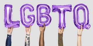 Purple alphabet balloons forming the word LGBTQ royalty free stock images Purple alphabet balloons forming the word LGBTQ royalty free stock images