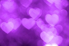 Purple heart bokeh background photo, abstract holiday backdrop Royalty Free Stock Image Purple heart bokeh background photo, abstract holiday backdrop Royalty Free Stock Image