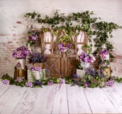 Purple lavender spring sett up with colourful flowers pink , purple, vintage wood parquet
