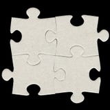 Puzzle denteux de carton gris photographie stock libre de droits Puzzle denteux de carton gris photographie stock libre de droits