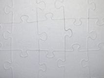 Puzzle pattern made of gray carton royalty free stock photo Puzzle pattern made of gray carton royalty free stock photo