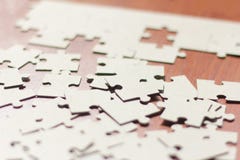 puzzles scattered on the table puzzles, the beginning of the Assembly stock photo puzzles scattered on the table puzzles, the beginning of the Assembly stock photo