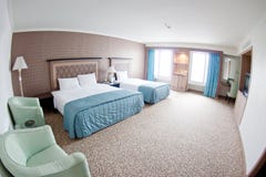 Quarto de hotel moderno imagem de stock royalty free Quarto de hotel moderno imagem de stock royalty free