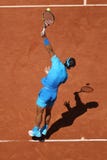 Quatorze campeões Rafael Nadal do grand slam das épocas na ação durante seu terceiro fósforo do círculo em Roland Garros 2015 imagens de stock royalty free Quatorze campeões Rafael Nadal do grand slam das épocas na ação durante seu terceiro fósforo do círculo em Roland Garros 2015 imagens de stock royalty free