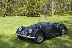 Classic 60s Morgan sports car painted in British Racing Green shown during the Rendez-vous British event stock photos Classic 60s Morgan sports car painted in British Racing Green shown during the Rendez-vous British event stock photos