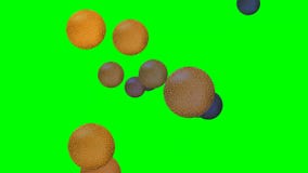 Quick flying small golden and metallic balls with cracked surface on green screen, video background for entertainment