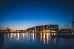 Quiet harbor in Amsterdam, Netherlands at sunset stock photography Quiet harbor in Amsterdam, Netherlands at sunset stock photography