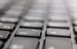 QWERTY black notebook laptop keyboard letters closeup, Q and A letters stock photo QWERTY black notebook laptop keyboard letters closeup, Q and A letters stock photo