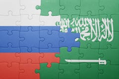 Raadsel met de nationale vlag van Saudi-Arabië en Rusland stock foto's Raadsel met de nationale vlag van Saudi-Arabië en Rusland stock foto's