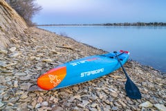 Racing stand up paddleboard by Starboard Royalty Free Stock Photo Racing stand up paddleboard by Starboard Royalty Free Stock Photo