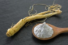 Radix Ginseng root next to White rice and Chinese Ginseng clarifying polishing facial mask in wooden spoon stock photos Radix Ginseng root next to White rice and Chinese Ginseng clarifying polishing facial mask in wooden spoon stock photos