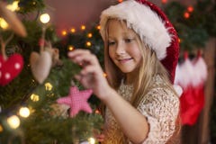 Ragazza sveglia durante il Natale immagini stock Ragazza sveglia durante il Natale immagini stock