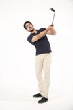 Ragazzo che gioca con il bastone di golf fotografia stock Ragazzo che gioca con il bastone di golf fotografia stock