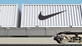 Railway Transportation Of Containers With Nike Inscription And Logo. Editorial 3D Rendering Royalty Free Stock Image Railway Transportation Of Containers With Nike Inscription And Logo. Editorial 3D Rendering Royalty Free Stock Image