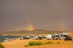 A rainbow as seen from a campground in the desert royalty free stock image A rainbow as seen from a campground in the desert royalty free stock image