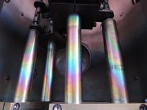 Rainbow on coated steel rods inside vacuum deposition chamber royalty free stock photo Rainbow on coated steel rods inside vacuum deposition chamber royalty free stock photo