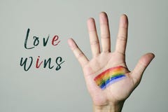 Rainbow flag and text love wins stock image Rainbow flag and text love wins stock image