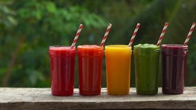 Rainbow from smoothies. Watermelon, papaya, mango, spinach and dragon fruit. Smoothies, juices, beverages, drinks