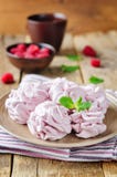 Raspberry Zephyr on a plate with fresh raspberries and mint stock images Raspberry Zephyr on a plate with fresh raspberries and mint stock images