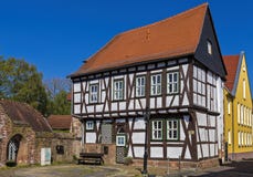 Half-timbered house and also town hall in the small town Gelnhausen in Hessen stock photos Half-timbered house and also town hall in the small town Gelnhausen in Hessen stock photos